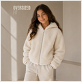 victor and jane girls cream faux fur full zip hoodie with an oversized fit worn by a young girl