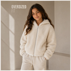 victor and jane girls cream faux fur full zip hoodie with an oversized fit worn by a young girl