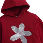 victor and jane girls red hoodie featuring a large silver embroidered daisy flower on the chest