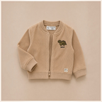 victor and jane beige corduroy zip-up jacket for boys featuring a small embroidered dinosaur and Hello text