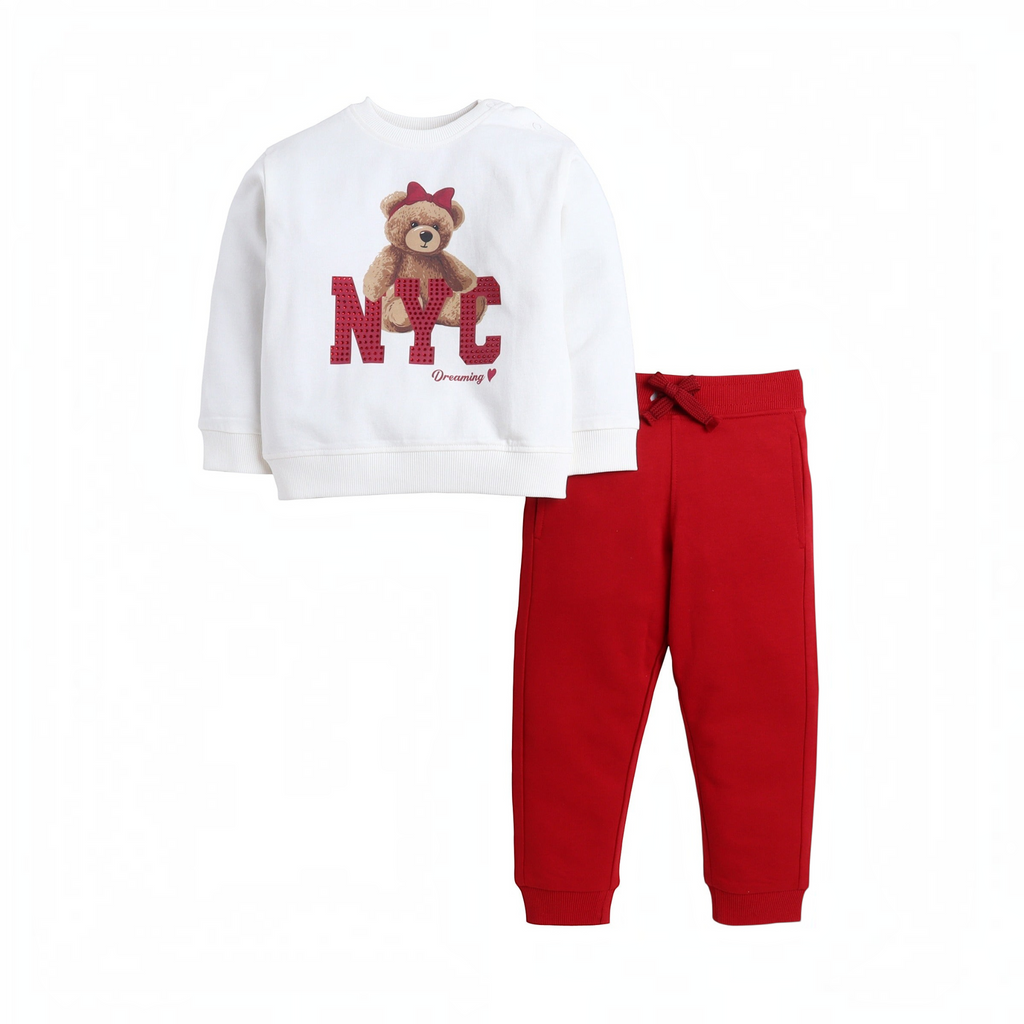 victor and jane 2-piece girls' set featuring a white sweatshirt with a teddy bear NYC print and red sweatpants