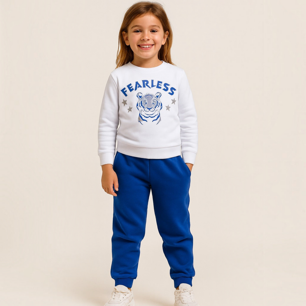 victor and jane white cotton sweatshirt with blue tiger graphic and text worn by a smiling young girl