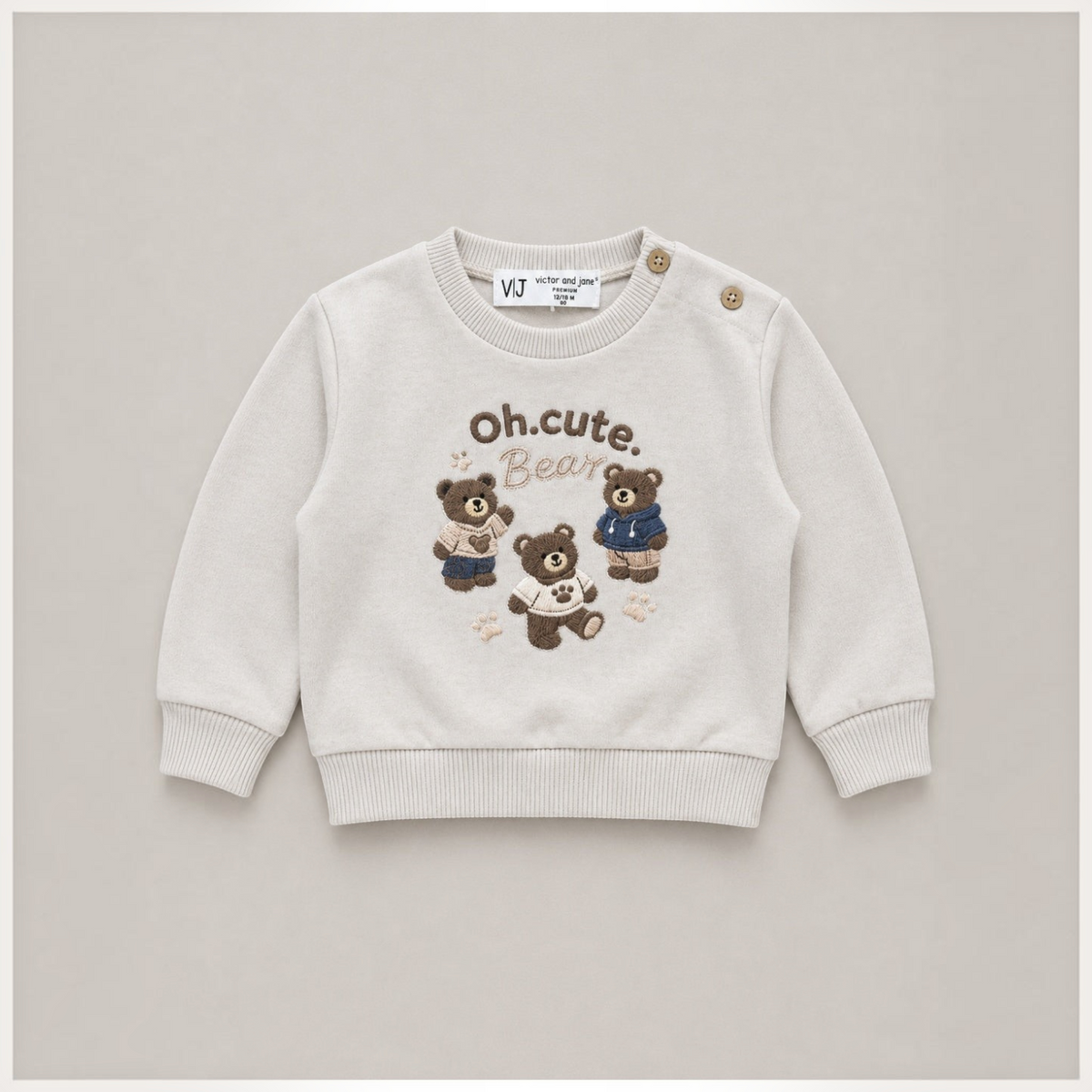 victor and jane beige sweatshirt for boys featuring embroidered bears and shoulder button detail