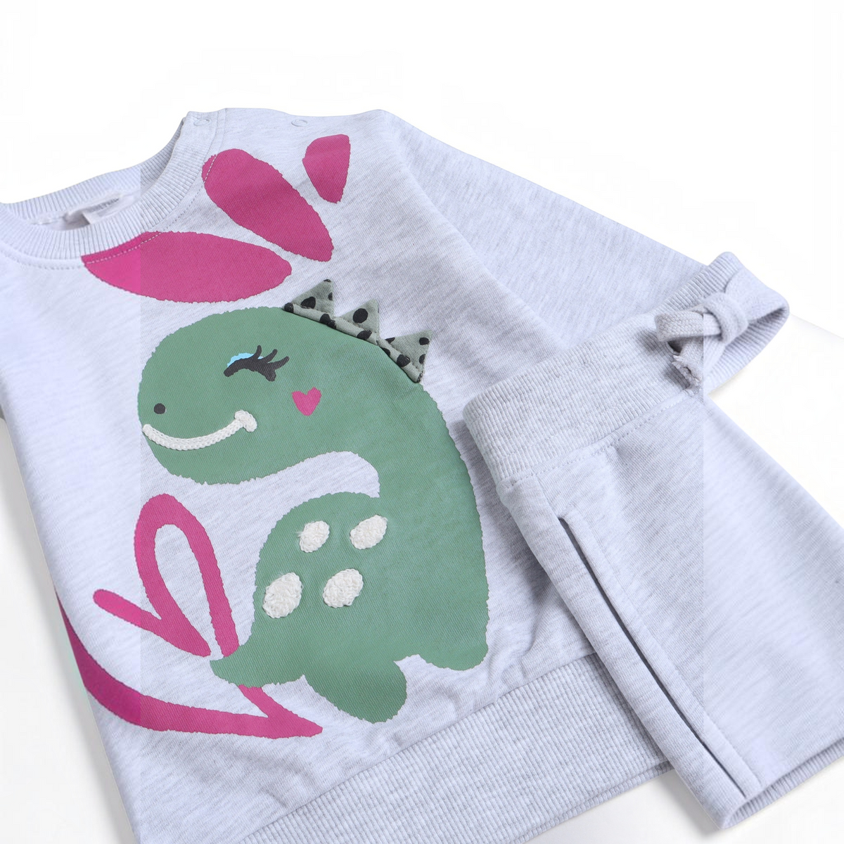 victor and jane 2-piece girls' set featuring a light grey sweatshirt with a green dinosaur and pink heart print