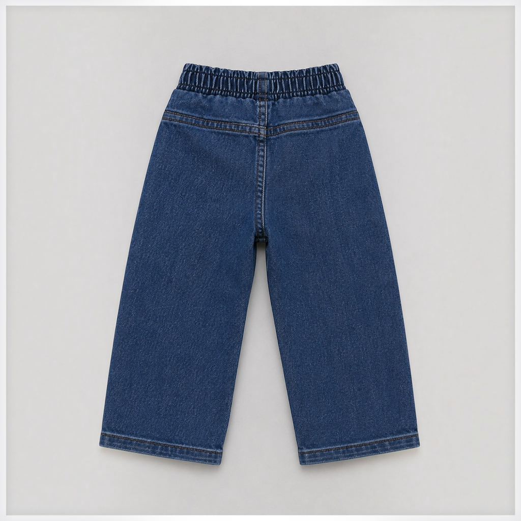 Back view of victor and jane boys denim pants with an elasticated waistband in a classic dark blue wash.