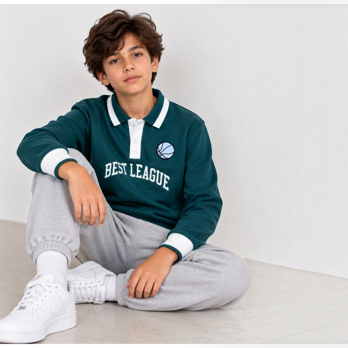 victor and jane boys' dark green fleece pullover with white collar, button placket, and Best League basketball graphic