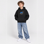 victor and jane boys black fleece hoodie with NYC graphic print, worn by a young boy with light wash jeans