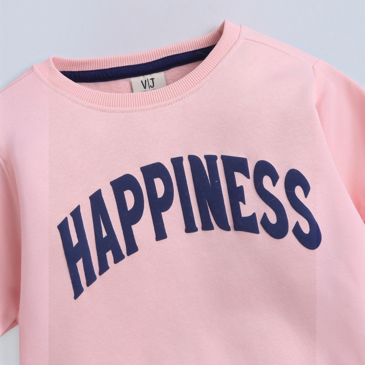 victor and jane girls EURA sweatshirt in light pink with navy blue HAPPINESS graphic print and ribbed crew neckline