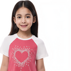 Young girl wearing a victor and jane pink and white raglan sleeve pajama dress with a heart floral graphic print
