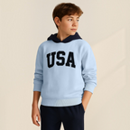 victor and jane boys light blue hoodie with navy hood and USA embroidered lettering worn by a young boy
