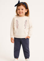 Dirkje Cotton Ruffled Floral Embroidered Sweatshirt And Joggers Set With Headband - White/Navy Blue