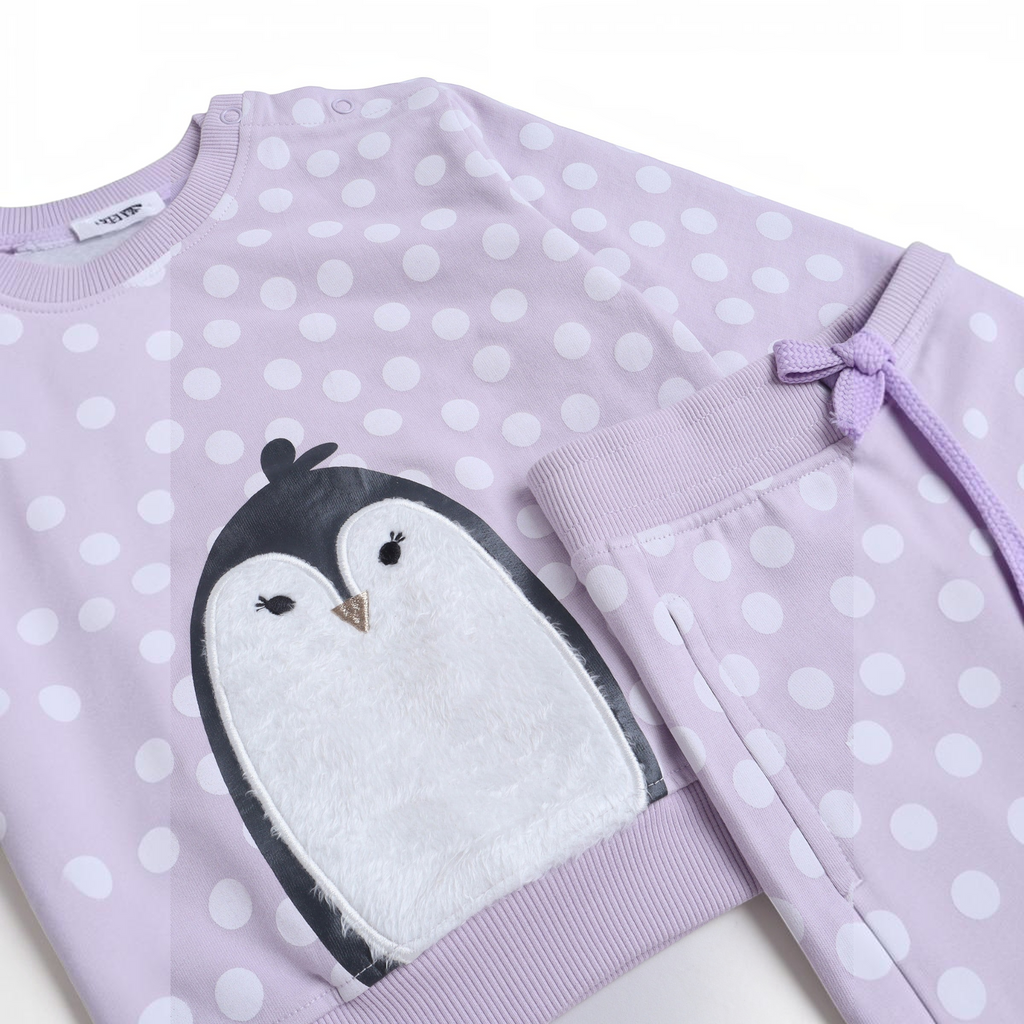 victor and jane 2-piece girl set featuring a lavender polka dot sweatshirt with a plush penguin and matching pants