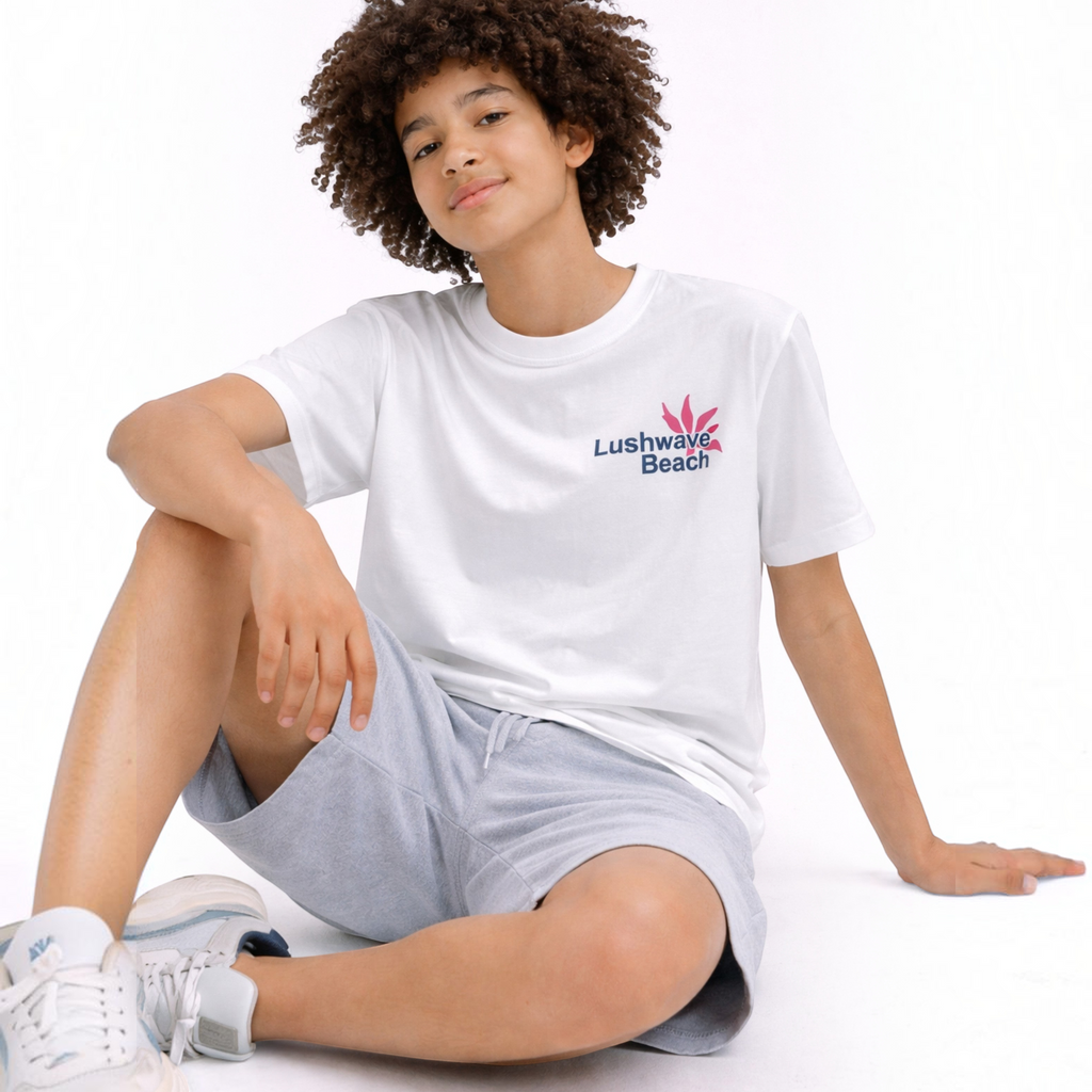 victor and jane boys white graphic t-shirt with Lushwave Beach logo worn by a boy with curly hair