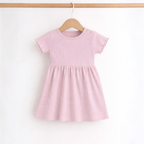 victor and jane baby girls pink ribbed short sleeve dress with lettuce edge trim on a wooden hanger