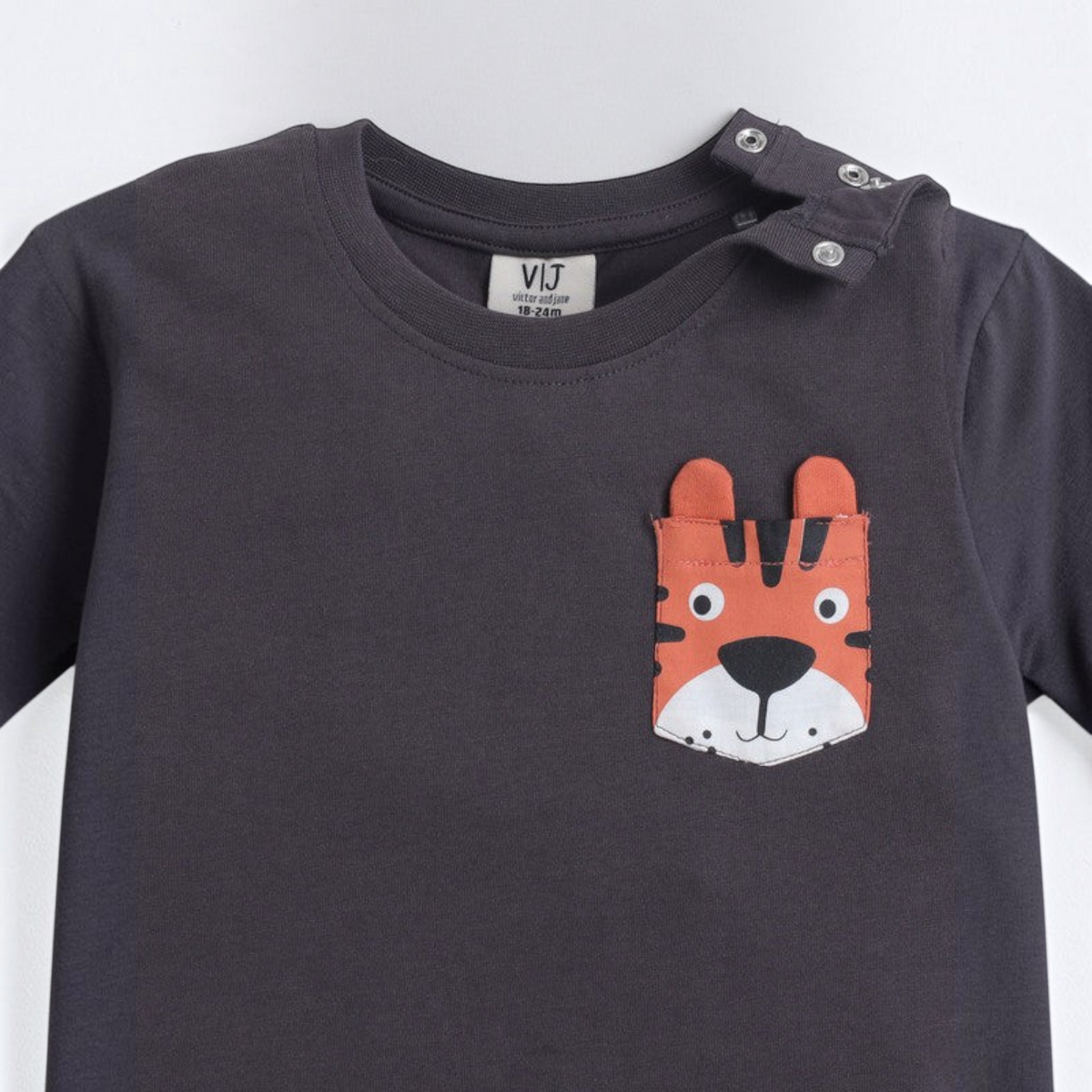 victor and jane charcoal grey baby boy t-shirt with a cute tiger face pocket detail and shoulder snap buttons