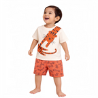 A happy toddler boy wearing a victor and jane cream t-shirt with a tiger print and matching orange tiger shorts.