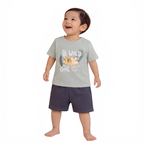 victor and jane baby boy wearing a sage green t-shirt with a tiger graphic and dark grey shorts