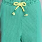 victor and jane baby boys green ribbed shorts with a bright yellow drawstring waist