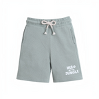 victor and jane sage green waffle knit baby boy shorts with a drawstring waist and Hero of the Jungle text print