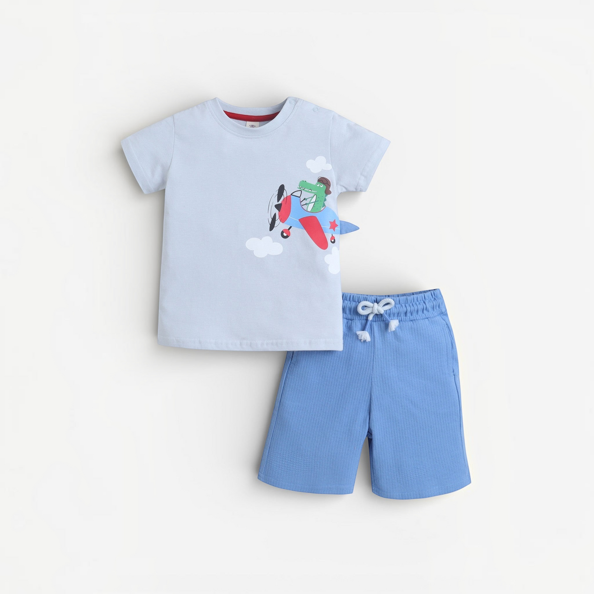 victor and jane baby boys 2-piece set with light blue t-shirt featuring a crocodile pilot and matching blue shorts