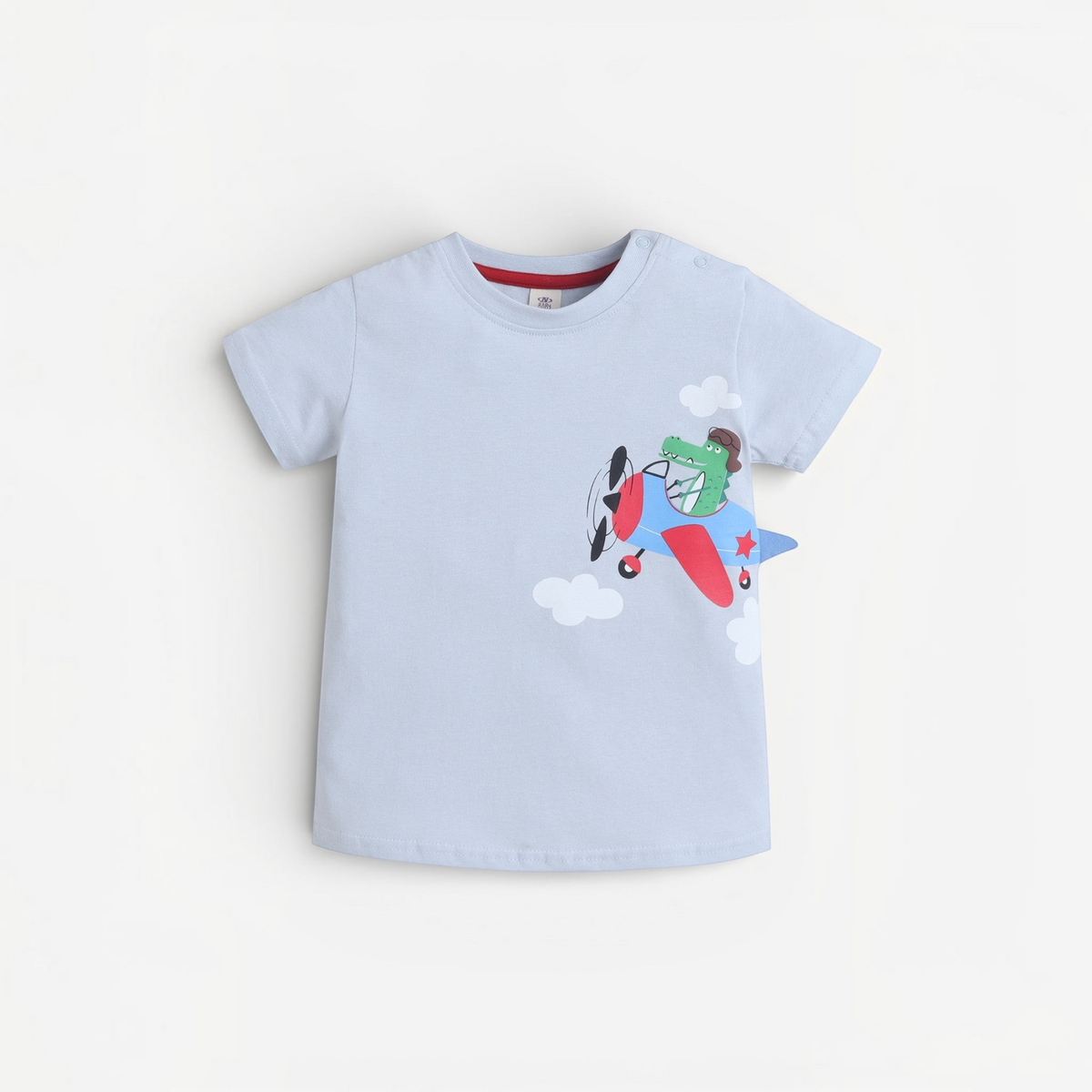 victor and jane baby boys light blue cotton t-shirt featuring a cute crocodile pilot flying a red and blue plane