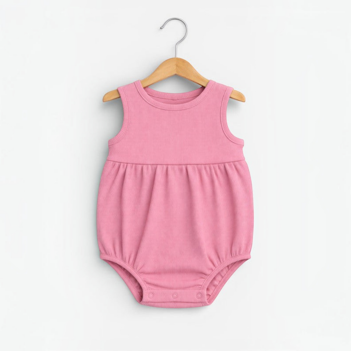 victor and jane baby girl pink ribbed sleeveless romper with a gathered waist and snap button closure