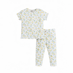 victor and jane baby girls 2-piece set featuring a white short-sleeve top and leggings with a yellow lemon print