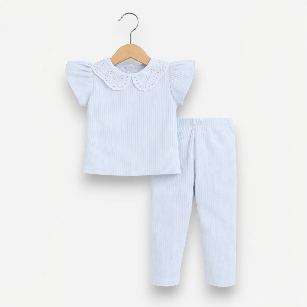 victor and jane baby girls 2-piece set featuring a light blue ribbed shirt with eyelet collar and matching leggings