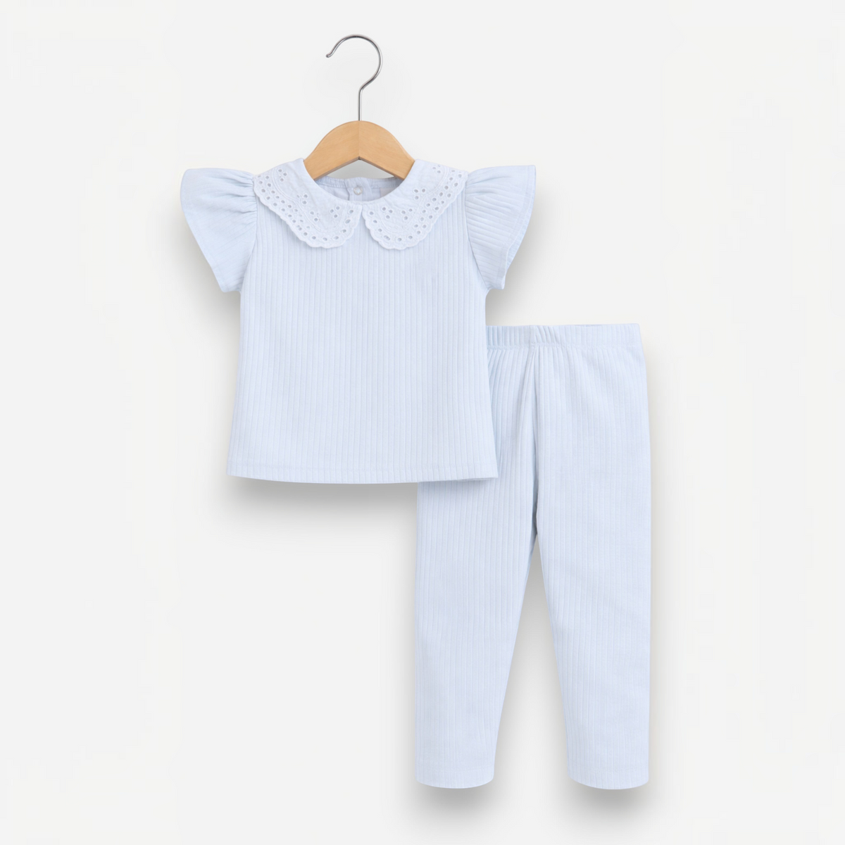 victor and jane baby girls 2-piece set featuring a light blue ribbed shirt with eyelet collar and matching leggings
