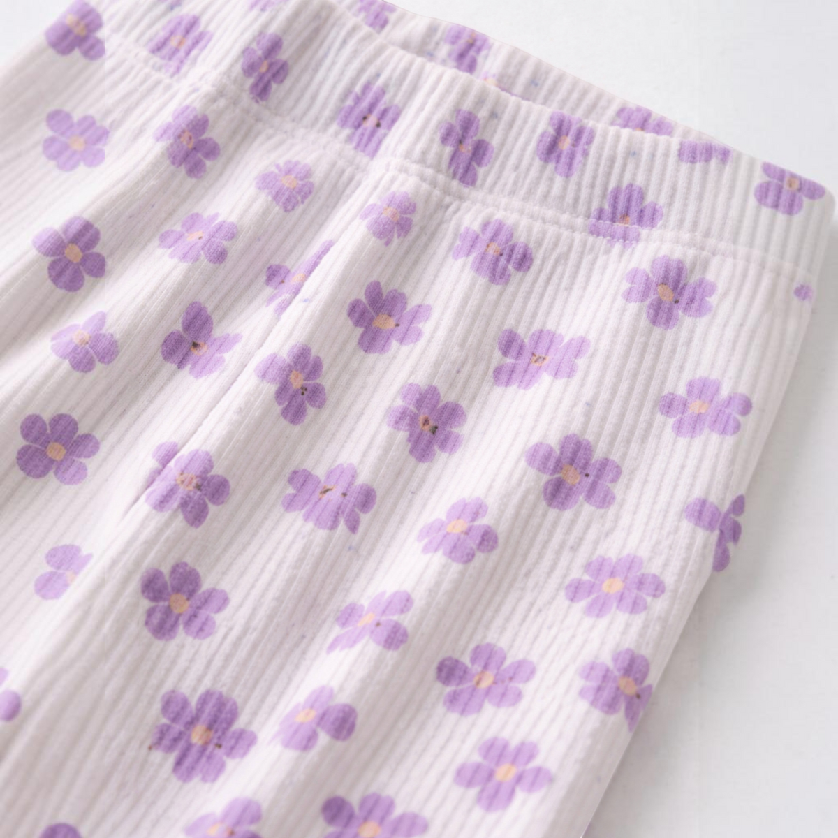 victor and jane girls pyjama bottoms in white ribbed fabric with a purple floral print pattern