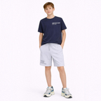 victor and jane boys navy graphic t-shirt and light grey drawstring shorts set worn by a young boy