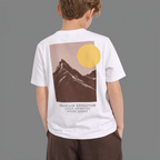 victor and jane boys white t-shirt featuring a mountain landscape graphic print with a yellow sun on the back