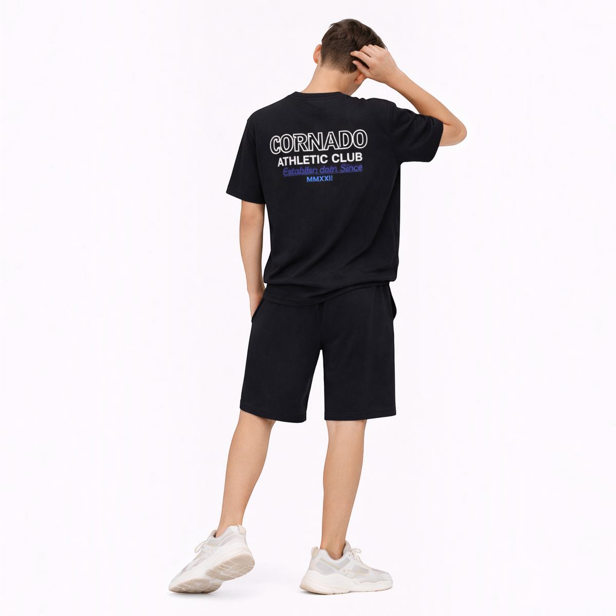 victor and jane boys black t-shirt and shorts set with white graphic print on back, worn by a model from behind
