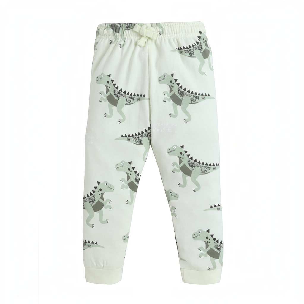 victor and jane baby boys cream joggers featuring a green dinosaur print with an elasticated drawstring waist