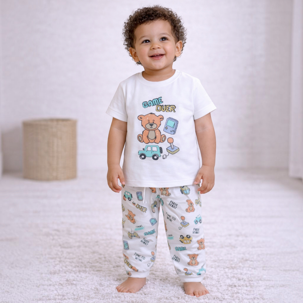 victor and jane baby boy wearing a white cotton t-shirt and matching pants with a colourful video game bear print