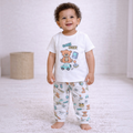 victor and jane baby boy wearing a white cotton t-shirt and matching pants with a colourful video game bear print