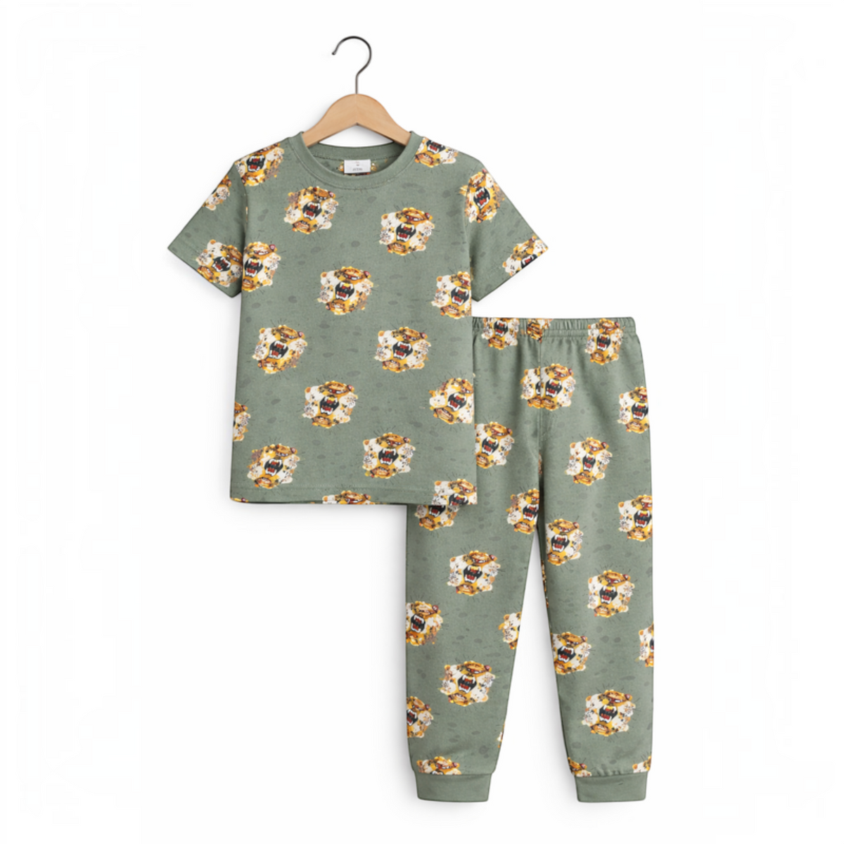 victor and jane boys two-piece pyjama set in sage green with an all-over tiger face print on a wooden hanger