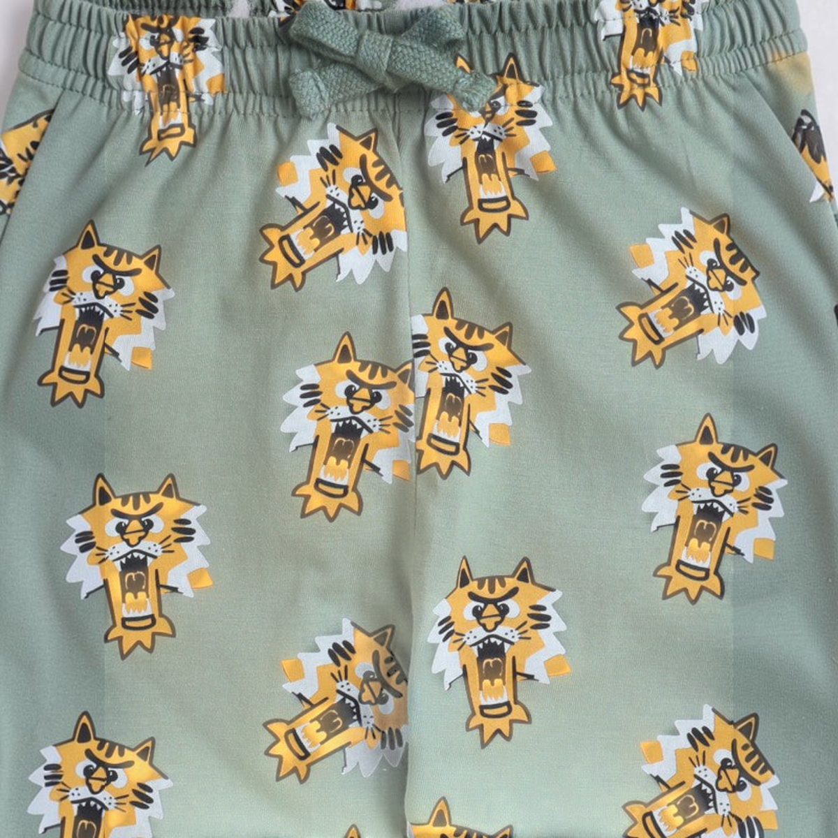 victor and jane boys pyjama set in sage green featuring a playful yellow and white tiger print with elastic waist