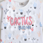 victor and jane girls white t-shirt featuring a pastel cactus print and Cactus Hug Me graphic text