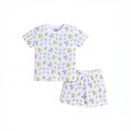 victor and jane girls white t-shirt and shorts set with a colourful lemon, flower, and leaf print pattern