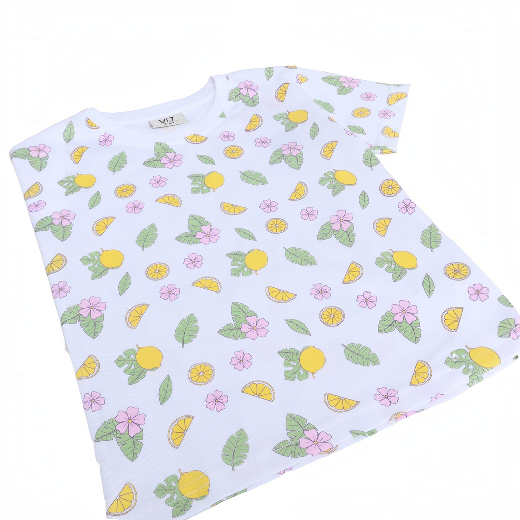 victor and jane girls white t-shirt with a vibrant lemon, leaf, and pink flower print pattern
