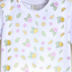 victor and jane girls white t-shirt featuring a playful lemon, leaf, and pink flower print pattern
