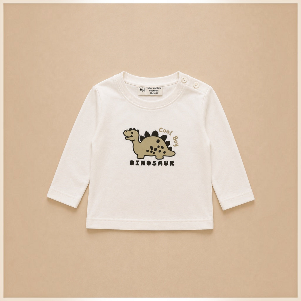 victor and jane boys long sleeve cream t-shirt with a cute dinosaur graphic and shoulder button closure