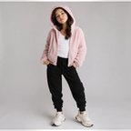 victor and jane girls pink faux fur full zip hooded jacket worn over a white tank top with black joggers