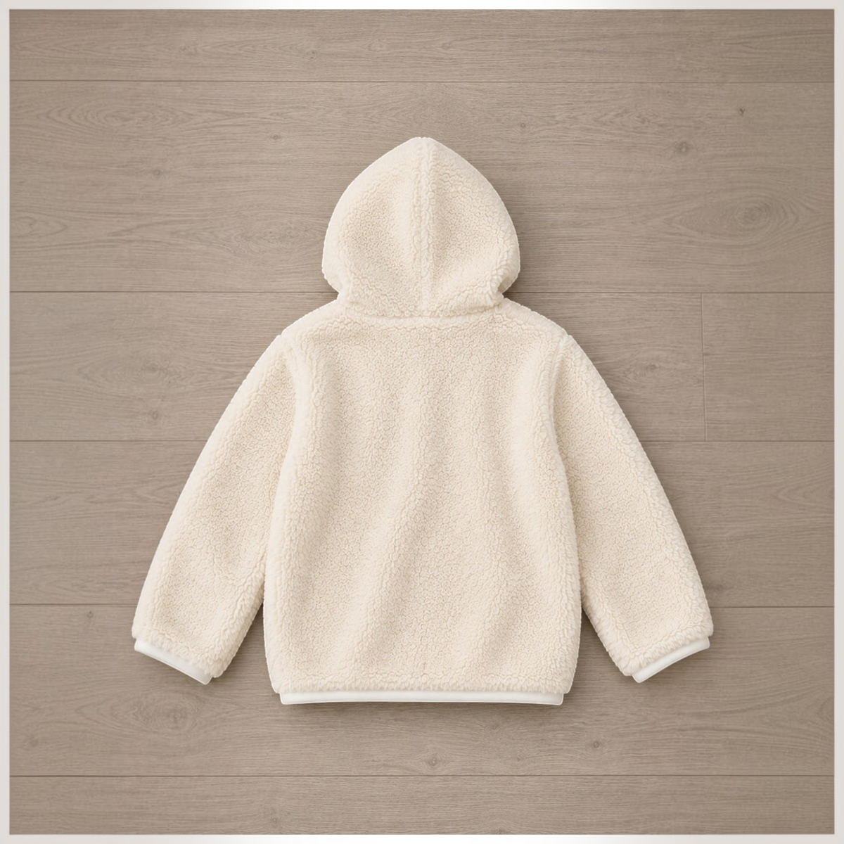 victor and jane girls cream faux fur full zip hooded jacket viewed from the back on a wooden floor