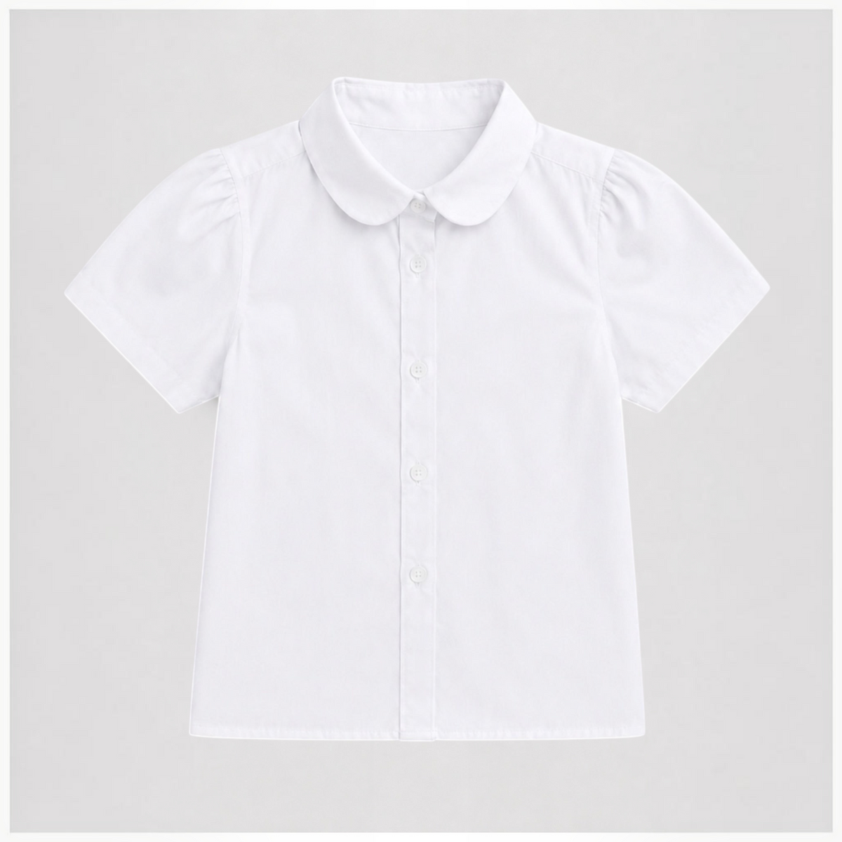 victor and jane white junior girls short sleeve collared shirt with a rounded peter pan collar and button front