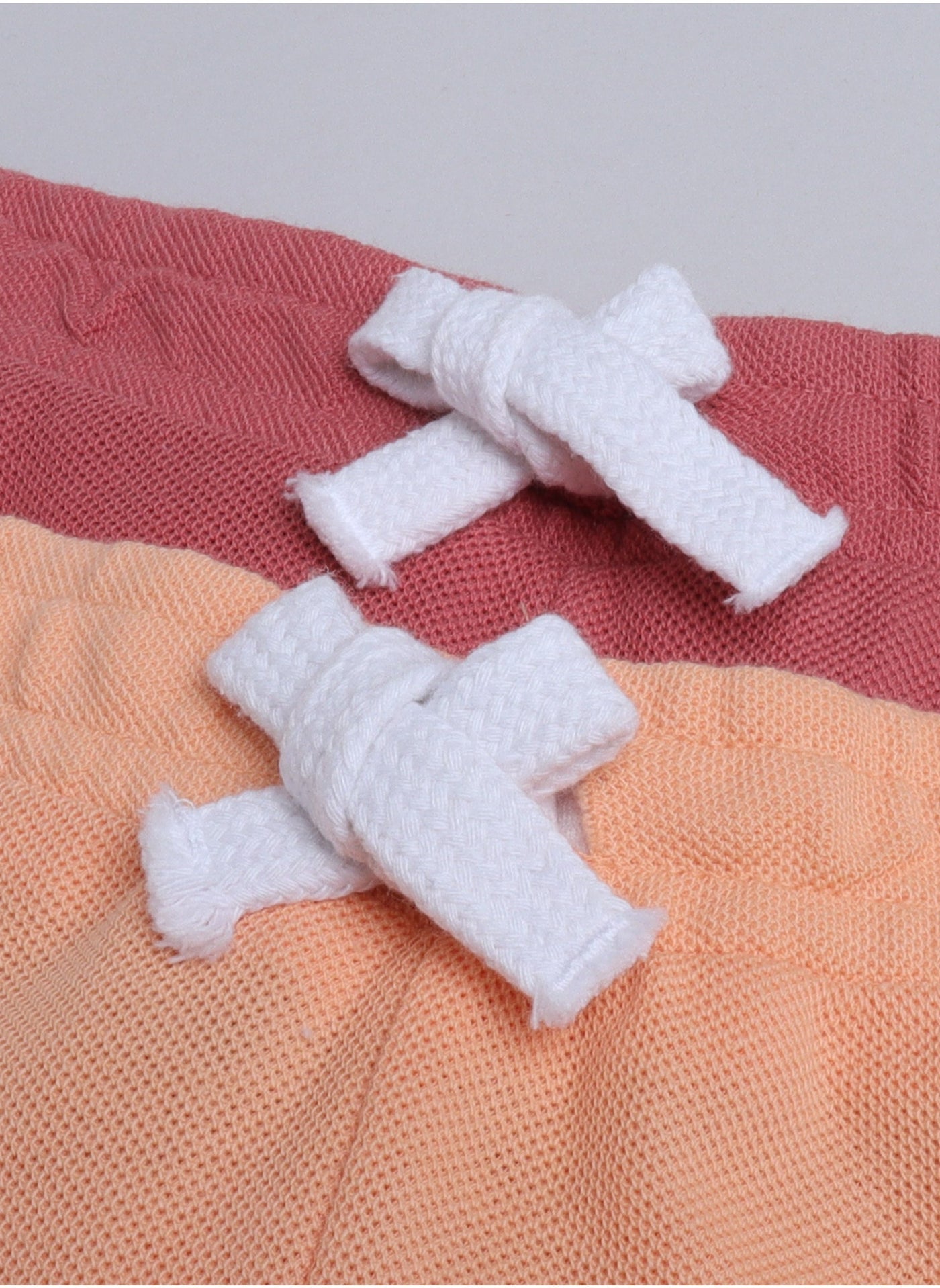 Victor and Jane Junior Boys' Slogan Print Shorts Solid , Lace-Up and Elasticated Waist - Peach and Coral- Pack of 2