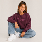 victor and jane girls purple fleece pullover with I Am Wierd and Proud Of It graphic print worn by a smiling girl