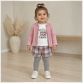 victor and jane 4-piece girls set with pink cardigan, graphic top, plaid skirt, and grey leggings on a toddler