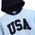victor and jane boys light blue hoodie with a navy blue hood and dark navy USA embroidered lettering on the chest